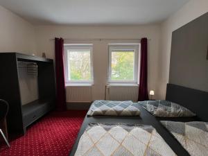 Postel nebo postele na pokoji v ubytování Hotel am Hafen