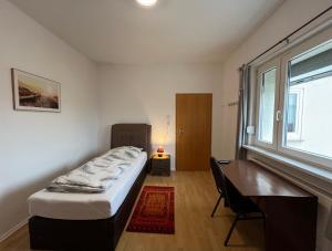 Postel nebo postele na pokoji v ubytování Hotel am Hafen + 4 fotografie