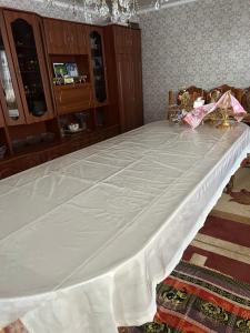 Postel nebo postele na pokoji v ubytování Aidar