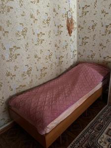 Postel nebo postele na pokoji v ubytování Aidar