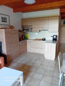 Kuchyň nebo kuchyňský kout v ubytování Apartmán Lipno A12
