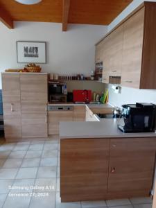Kuchyň nebo kuchyňský kout v ubytování Apartmán Lipno A12