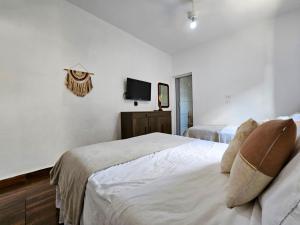 Postel nebo postele na pokoji v ubytování Casa perto do Parque dos Saltos - Brotas - Casa 3