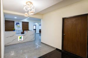 Vstupní hala nebo recepce v ubytování Treebo Iris Executive, Hinjewadi