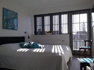 Postel nebo postele na pokoji v ubytování Hals Hotel