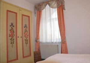 Postel nebo postele na pokoji v ubytování Apartment Grattschlössl