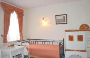 Postel nebo postele na pokoji v ubytování Apartment Grattschlössl