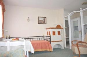 Postel nebo postele na pokoji v ubytování Apartment Grattschlössl
