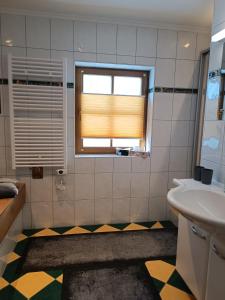 Koupelna v ubytování Apartment Haus Klingspitz Pilzegg