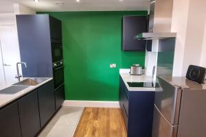 Køkken eller tekøkken på City SuperHost Stunning Northern Quarter Apartment