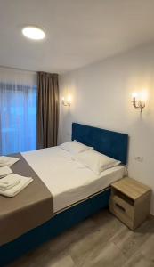 Postel nebo postele na pokoji v ubytování Hotel Nalba-Dalia Jupiter