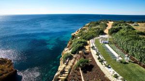 an aerial view of the ocean from a cliff at Tivoli Carvoeiro in Carvoeiro