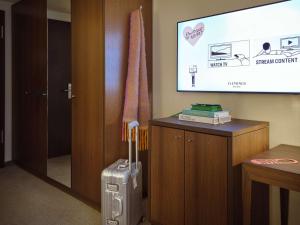 TV a/nebo společenská místnost v ubytování Metropolitan Hotel by Flemings