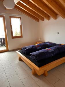 Postel nebo postele na pokoji v ubytování Chalet Adler Bettmeralp