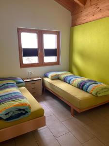 Postel nebo postele na pokoji v ubytování Chalet Adler Bettmeralp