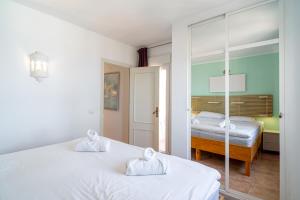 Postel nebo postele na pokoji v ubytování Ladera del Mar 32 Casasol + 33 fotografií