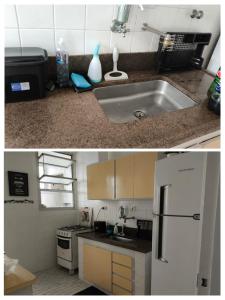 une cuisine avec un évier et un réfrigérateur blanc dans l'établissement GUARUJÁ - PRAIA DE PITANGUEIRAS, à Guarujá