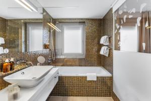 A bathroom at Hotel D - Basel - Fully Renovated 2025