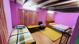 Una cama o camas en una habitación de Maa Buu Chhen