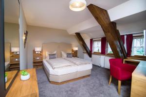 Postel nebo postele na pokoji v ubytování Burg Colmberg Hotel + 37 fotografií