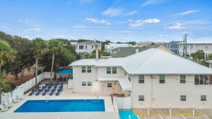 an aerial view of a house and a swimming pool at Beachside Villa Unit 3 in Tybee Island