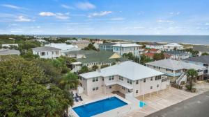 an aerial view of a house with a swimming pool at Beachside Villa Collection - 6 Bedroom in Tybee Island