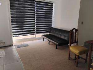 Χώρος καθιστικού στο Departamento para 6 personas en Quintero