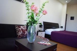 Voodi või voodid majutusasutuse Hotel Grig toas