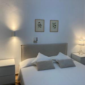 Postel nebo postele na pokoji v ubytování En-suite Quadruple Room-Giardino A Mare