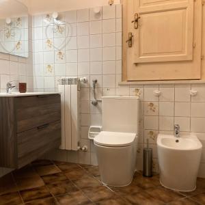 Koupelna v ubytování En-suite Quadruple Room-Giardino A Mare