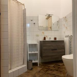 Koupelna v ubytování En-suite Quadruple Room-Giardino A Mare