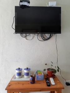 Μια τηλεόραση ή/και κέντρο ψυχαγωγίας στο Alojamientos Ambar +3 φωτογραφίες