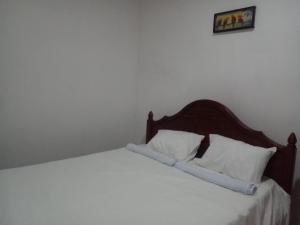 Postel nebo postele na pokoji v ubytování Serene Nest