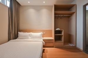 Simple Sanctuary Tanjung Tokong客房内的一张或多张床位