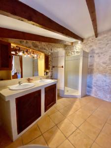 a bathroom with a sink and a shower at Villas2meet Jimmy Lloret in Lloret de Vistalegre +15 photos