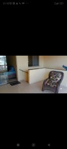 a picture of a room with a blanket on the floor at Casa Guaibim ótima localização in Valença