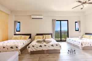 Ένα ή περισσότερα κρεβάτια σε δωμάτιο στο Island Nook B&B