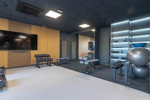 Posilňovňa alebo fitness centrum v ubytovaní WrocApartments WestCenter - Legnicka Residence