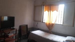 Postel nebo postele na pokoji v ubytování Casa Santiago