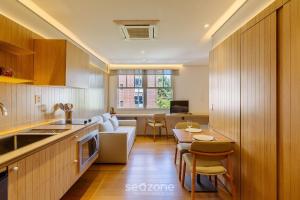 Kuchyň nebo kuchyňský kout v ubytování Lindas Unidades no Bairro Auxiliadora em PoA - CEN