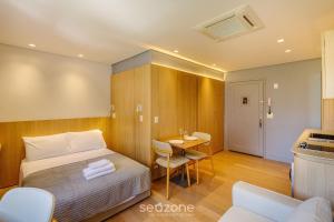 Postel nebo postele na pokoji v ubytování Lindas Unidades no Bairro Auxiliadora em PoA - CEN