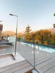 Bazén v ubytování Cómodo y acogedor Cercano a centros Ski Cama King Terraza TV360 nebo v jeho okolí