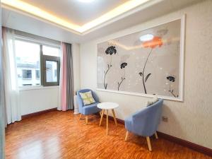 Fotografie z fotogalerie ubytování 凨凪凮夙雪山观景酒店 v destinaci Baisha