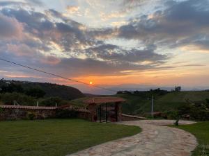 a gazebo in a field with a sunset in the background at Villa Nikitina in Los Santos