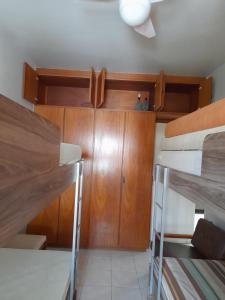 Ένα ή περισσότερα κρεβάτια σε δωμάτιο στο Condomínio Edifício Solar Maripuanã