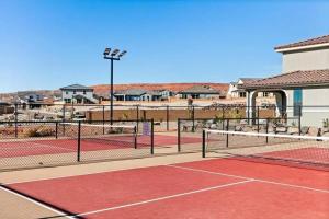 a tennis court with two tennis courts at Always the Weekend - Pool, Lazy River, Waterslide in Washington +34 photos