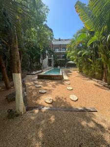 Κήπος έξω από το Casa Tulum Hotel