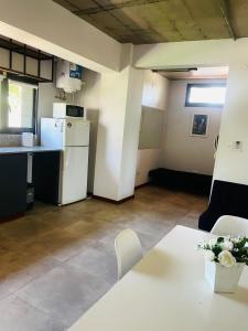 Kuchyň nebo kuchyňský kout v ubytování Los plátanos 1 y 2