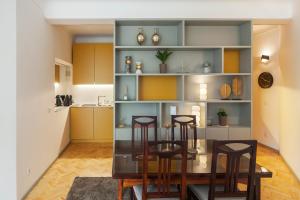 Χώρος καθιστικού στο CdC Apartments by Casa do Conto