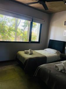 Postel nebo postele na pokoji v ubytování Los plátanos 1 y 2